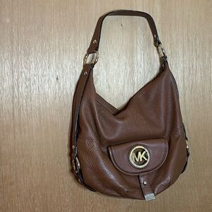 Michael kors handbag with some damage